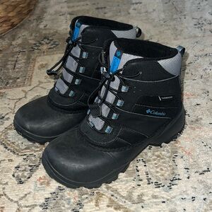 Boys Columbia boots.